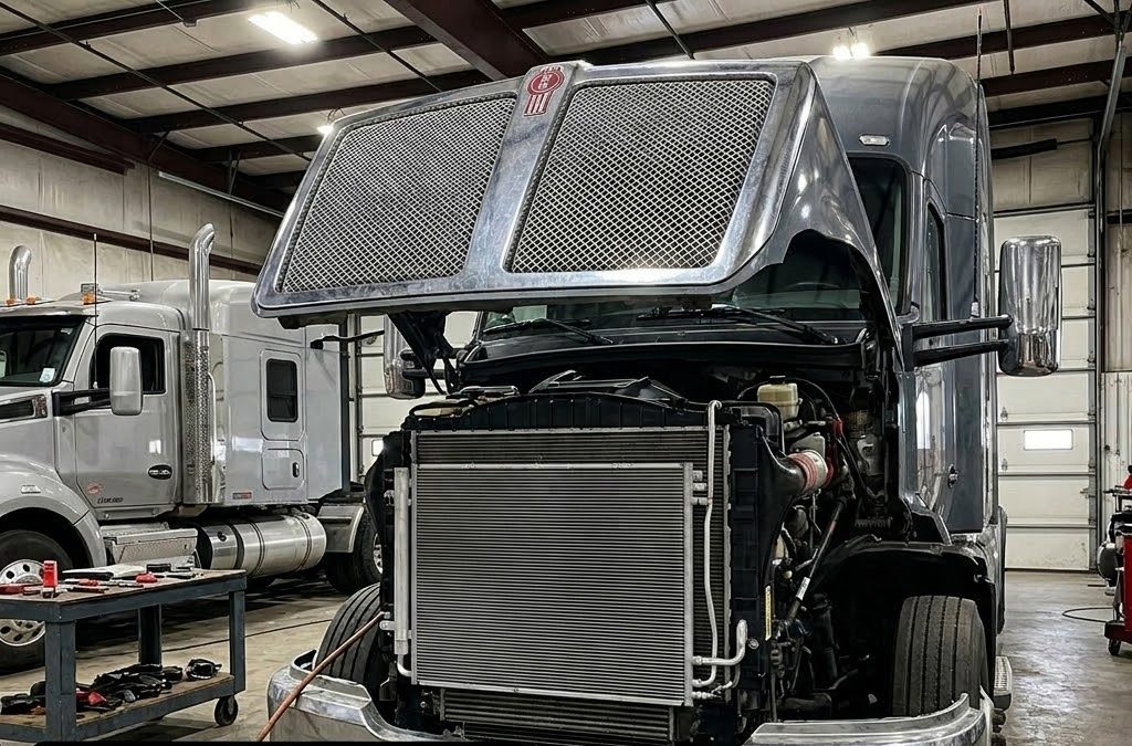 Semi truck A/C condenser removed from truck — aluminum core with fins for heat dissipation
